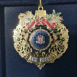 FBI CHRISTMAS ORNAMENT. GOLD METAL. New in box